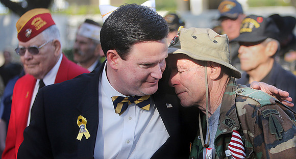 Commissioner Dailey and Michael Gavin. Photo by Mike Ewen / Tallahassee Democrat.
