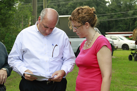Congressman Southerland and Commissioner Dozier observe and discuss the National Veteran Cemetery Site.