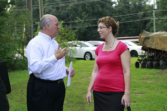Congressman Southerland and Commissioner Dozier observe and discuss the National Veteran Cemetery Site.