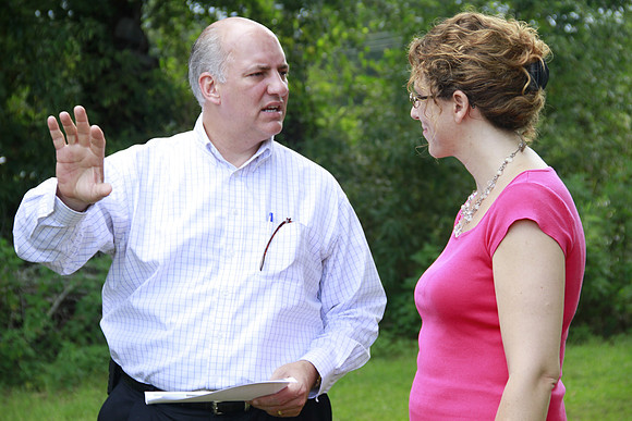 Congressman Southerland and Commissioner Dozier observe and discuss the National Veteran Cemetery Site.