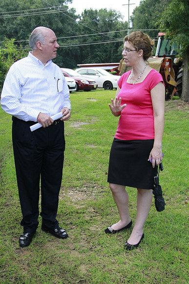 Congressman Southerland and Commissioner Dozier observe and discuss the National Veteran Cemetery Site.